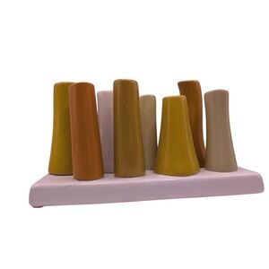 Chive Pooley 8-Tube Bud Vase Ceramic Mustard Yellow Ochre Cream white base
